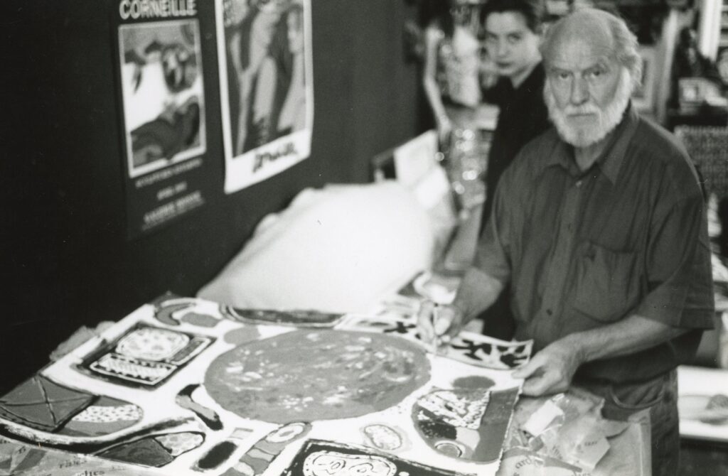 Corneille - signing prints - 1990s